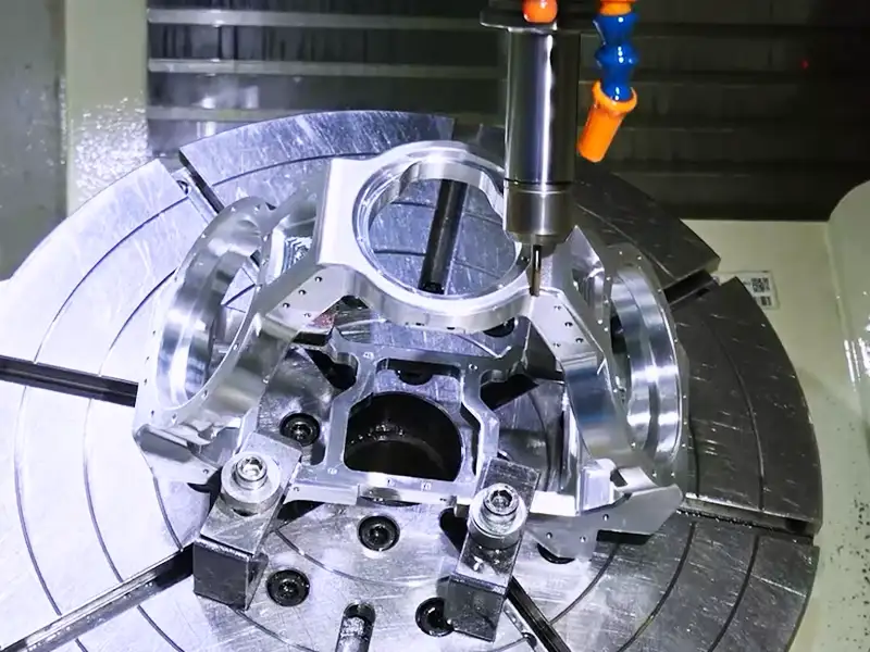 5-axis CNC milling process machining a complex aluminum part