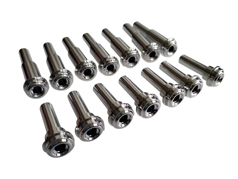 Polished metal turned parts with a smooth reflective surface finish