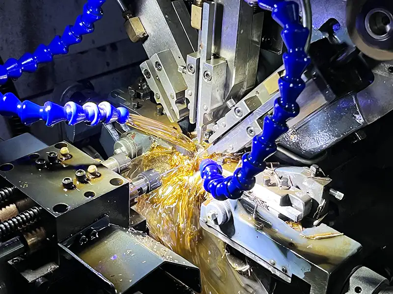 Swiss machining process producing a small precision turned part